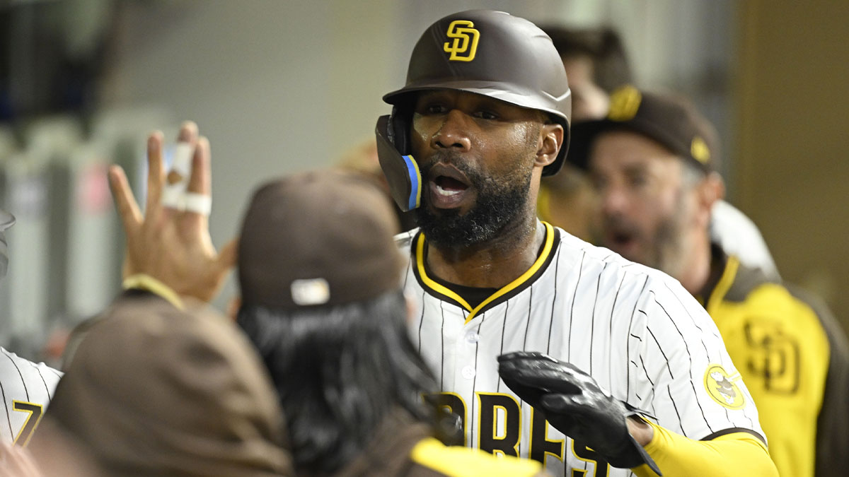 San Diego Padres left fielder Jason Heyward (22) is congratulated after scoring during the fourth inning against the San Francisco Giants at Petco Park.