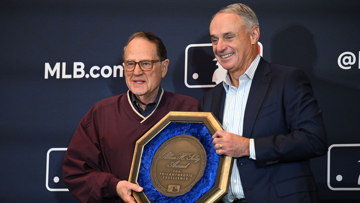 MLB commissioner Rob Manfred (right) presents the Allan H. Selling Award for philanthropic excellence to Chicago White Sox owner Jerry Reinsdorf (left) during the 2022 MLB Winter Meetings at Manchester Grand Hyatt.