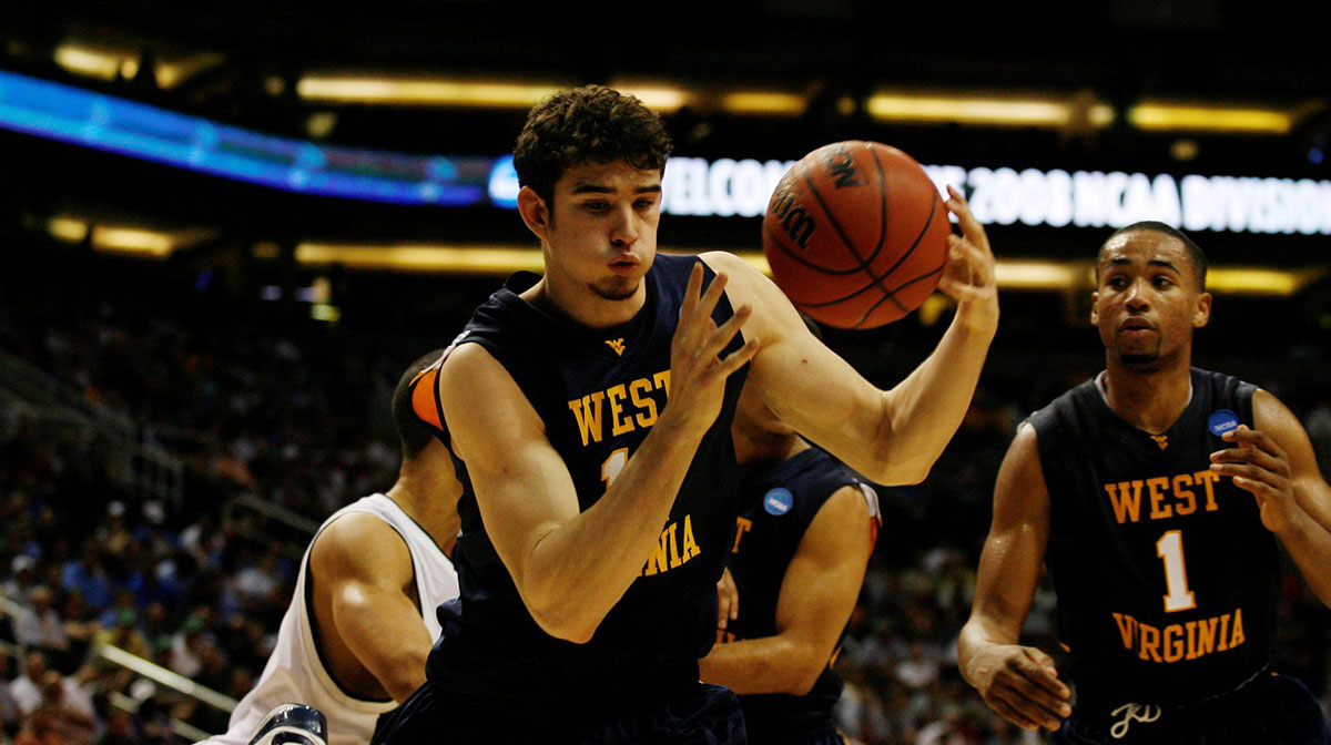 West Virginia Mountaineers forward Joe Alexander (11) pulls down a rebound in the first half against the Xavier Musketeers during the west regional semi-final of the 2008 NCAA Division I Mens Basketball Championship at the US Airways Center.