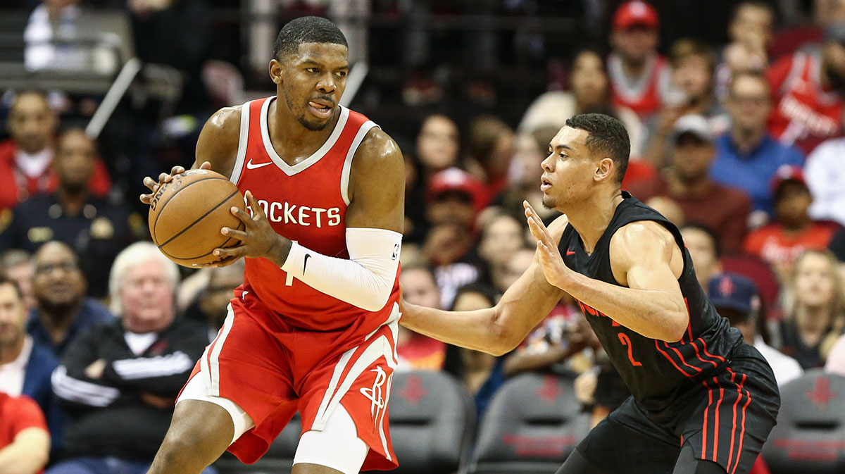 Houston Rockets guard Joe Johnson (7) controls the ball as Portland Trail Blazers guard Wade Baldwin IV (2) defends during the first half at Toyota Center.