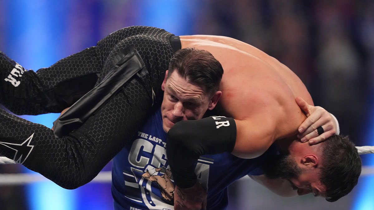 John Cena, who only has limited dates remaining on his farewell tour, with Finn Bálor on his shoulders at the 2025 WWE Royal Rumble.