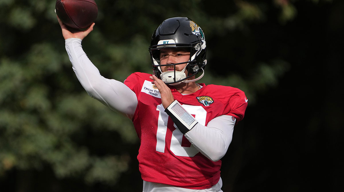 Oct 17, 2024; Watford, United Kingdom; Jacksonville Jaguars quarterback John Rhys Plumlee (18) throws the ball during practice at The Grove. Mandatory Credit: Kirby Lee-Imagn Images