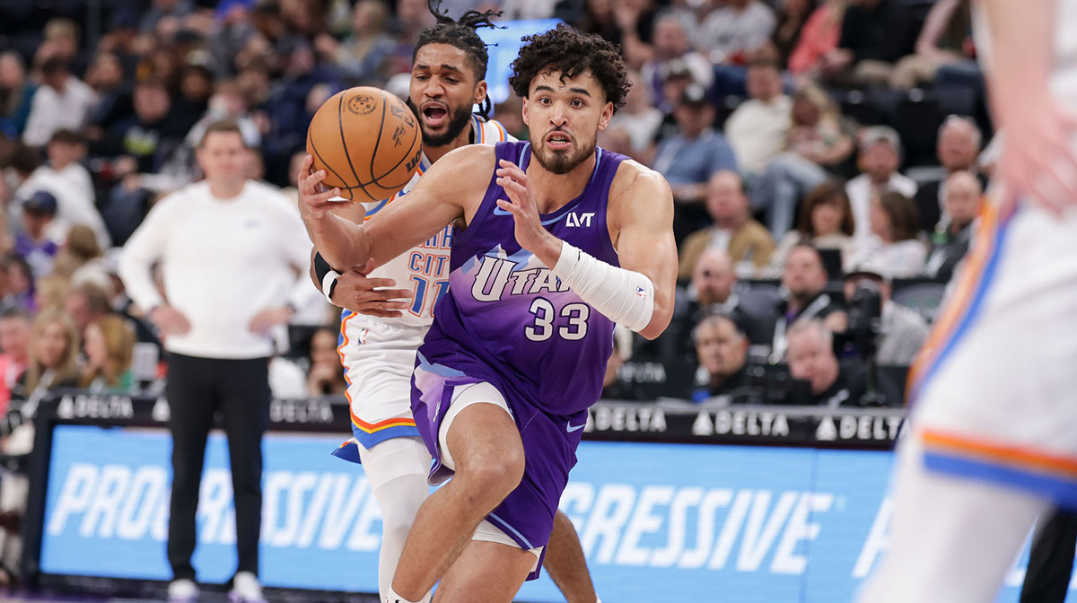 Utah Jazz guard Johnny Juzang (33) drives to the basket during the second half against the Oklahoma City Thunder at Delta Center.
