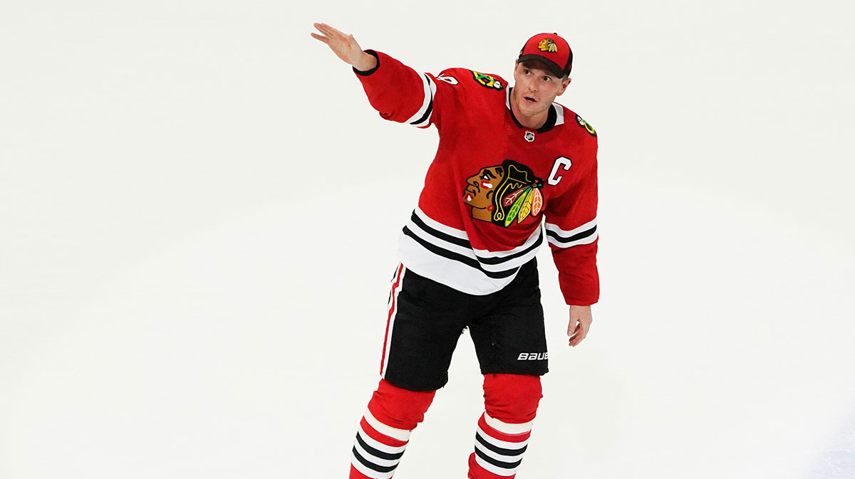 Chicago Blackhawks center Jonathan Toews (19) is honored after the game against the Philadelphia Flyers. He played his last game as a Blackhawk, at United Center.