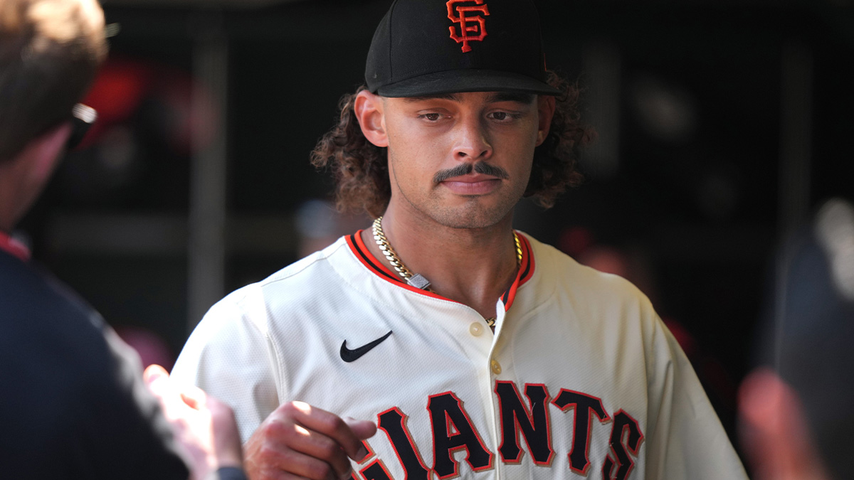 San Francisco Giants starting pitcher Jordan Hicks (center) is congratulated by teammates during the sixth inning against the Colorado Rockies at Oracle Park.