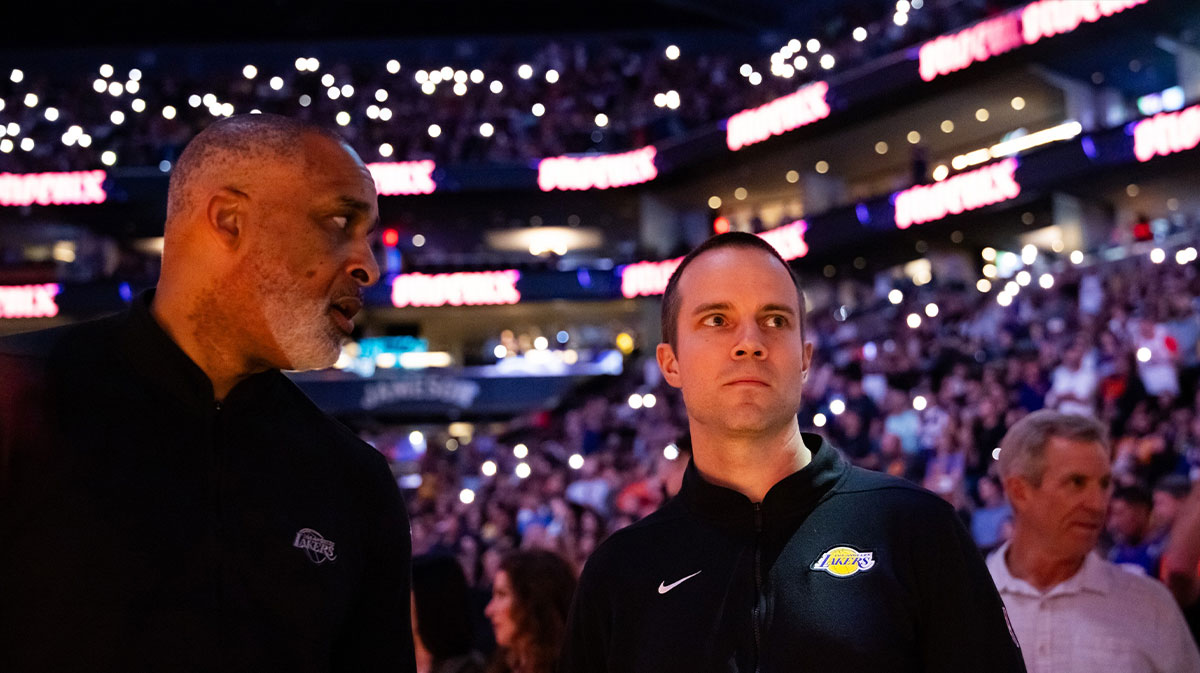 Los Angeles Lakers assistant coach Phil Handy (left) and Jordan Ott against the Phoenix Suns at Footprint Center.