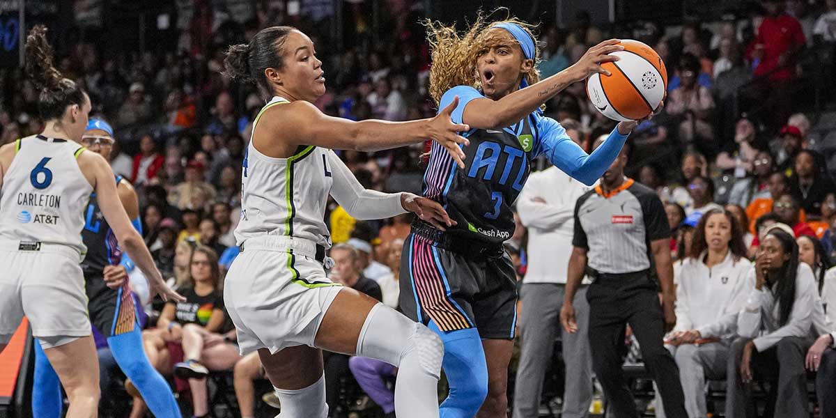 Atlanta Dream guard Jordin Canada (3) tries to pass against Minnesota Lynx forward Napheesa Collier (24) during the first half at Gateway Center Arena at College Park.