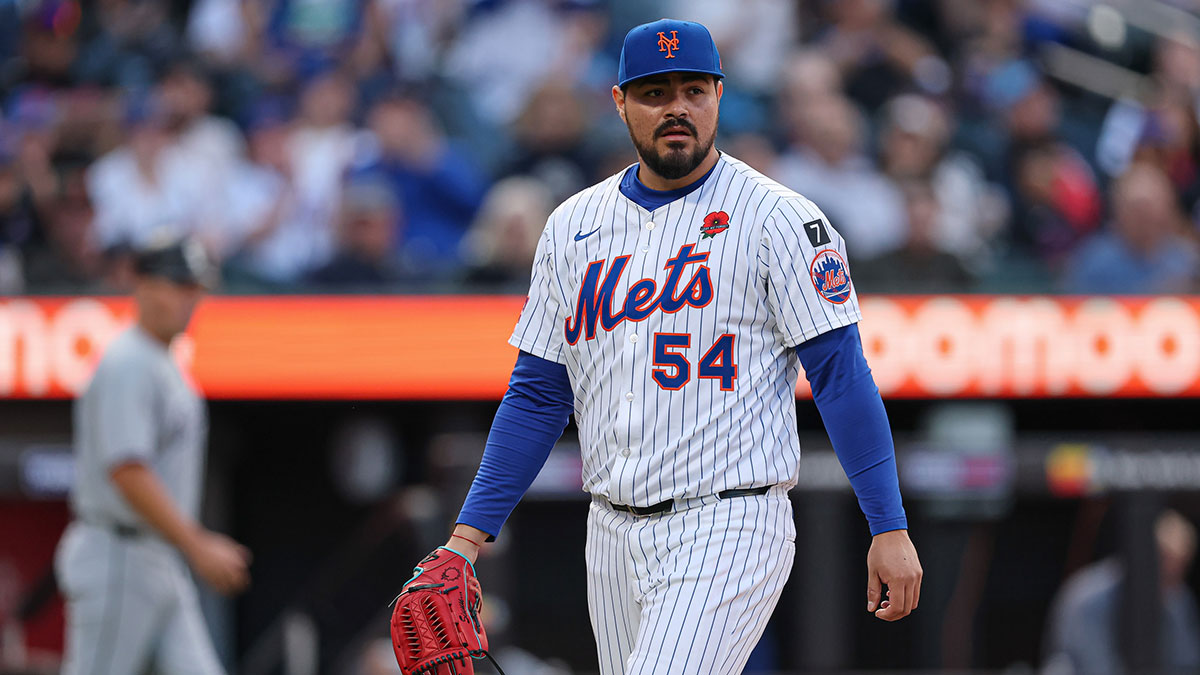 New York Mets relief pitcher Jose Castillo (54) walks off the field after recording a strike out to end the top of the eighth inning against the Chicago White Sox at Citi Field.