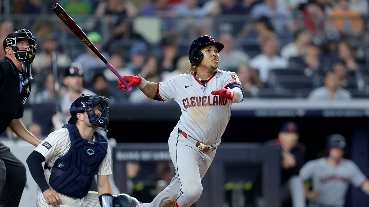 Jun 5, 2025; Bronx, New York, USA; Cleveland Guardians third baseman Jose Ramirez (11) follows through on a single against the New York Yankees during the seventh inning at Yankee Stadium.
