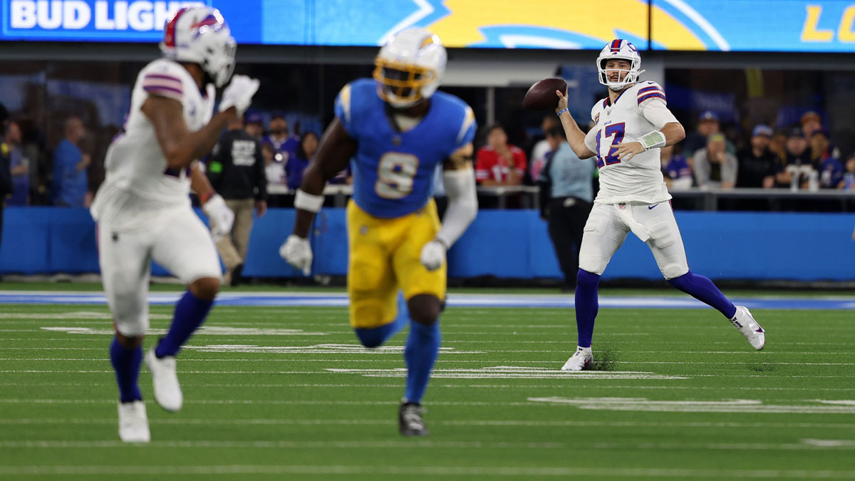 Buffalo Bills quarterback Josh Allen (17) throws 57-yard touchdown pass to wide receiver Gabe Davis (13) during the second quarter against the Los Angeles Chargers at SoFi Stadium.