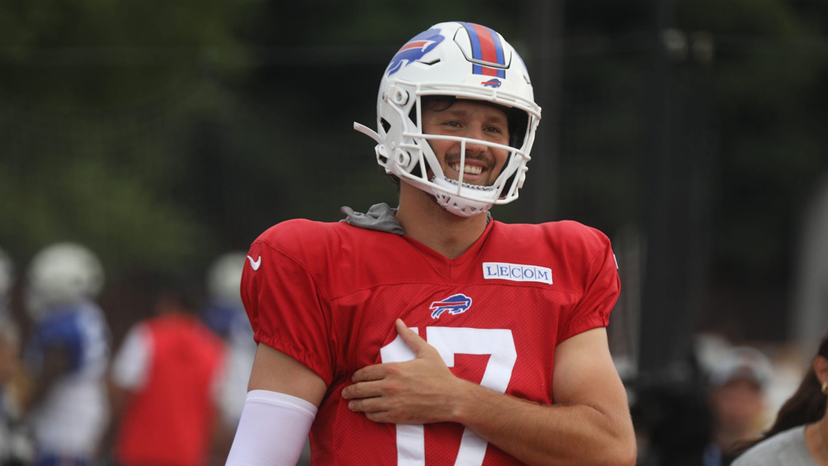 Bills Josh Allen laughs as he jokes with teammates as he moves to another practice field with other offensive players during Bills training camp at St. John Fisher University in Pittsford, NY on Aug. 5, 2024.
