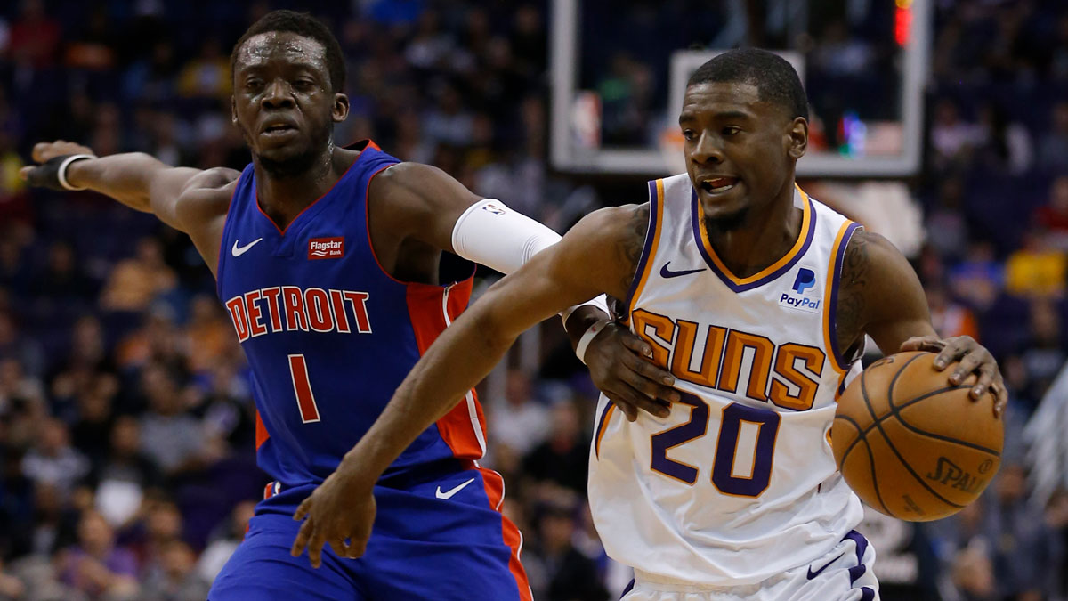 Phoenix Suns forward Josh Jackson (20) drives past Detroit Pistons guard Reggie Jackson (1) in the first half during an NBA basketball game at Talking Stick Resort Arena. Mandatory Credit: