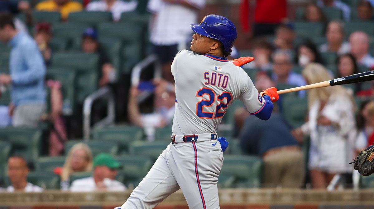 Jun 17, 2025; Atlanta, Georgia, USA; New York Mets right fielder Juan Soto (22) hits a home run against the Atlanta Braves in the first inning at Truist Park.