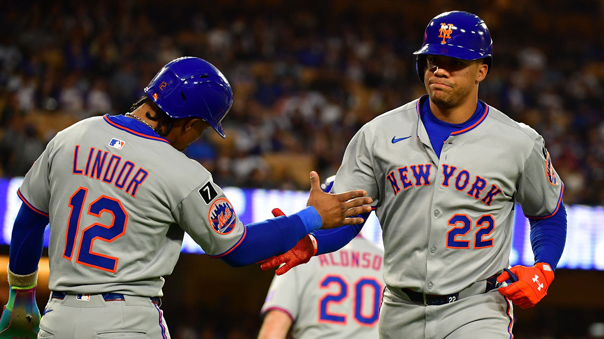 Jun 3, 2025; Los Angeles, California, USA; New York Mets outfielder Juan Soto (22) reacts with shortstop Francisco Lindor (12) after hitting a two run home run against the Los Angeles Dodgers during the third inning at Dodger Stadium. Mandatory Credit: Gary A. Vasquez-Imagn Images