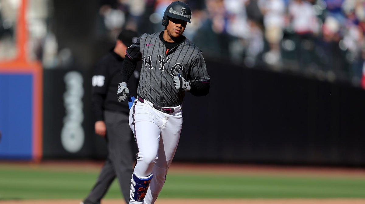 New York Mets right fielder Juan Soto (22) rounds the bases after hitting a solo home run against the Colorado Rockies during the fourth inning at Citi Field.