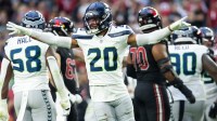 Seattle Seahawks safety Julian Love (20) celebrates a missed field goal by the Arizona Cardinals in the second half at State Farm Stadium.
