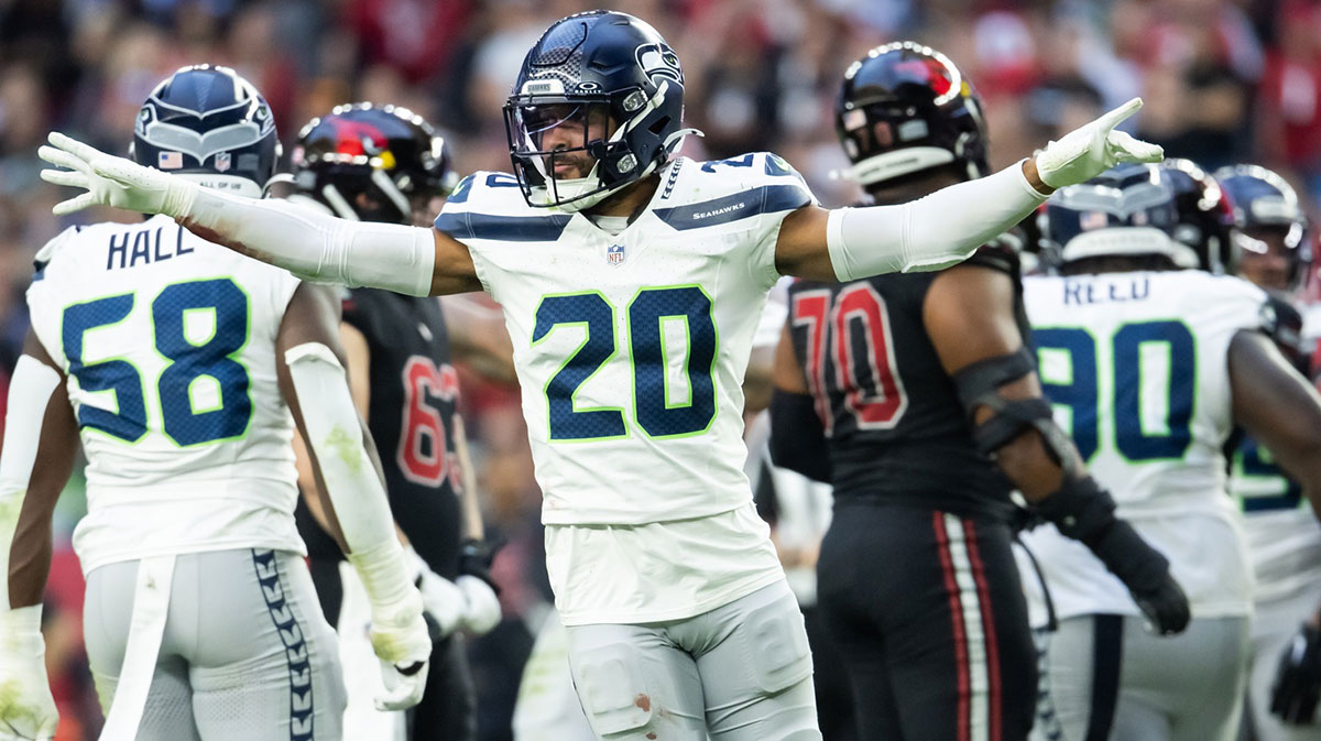 Seattle Seahawks safety Julian Love (20) celebrates a missed field goal by the Arizona Cardinals in the second half at State Farm Stadium.