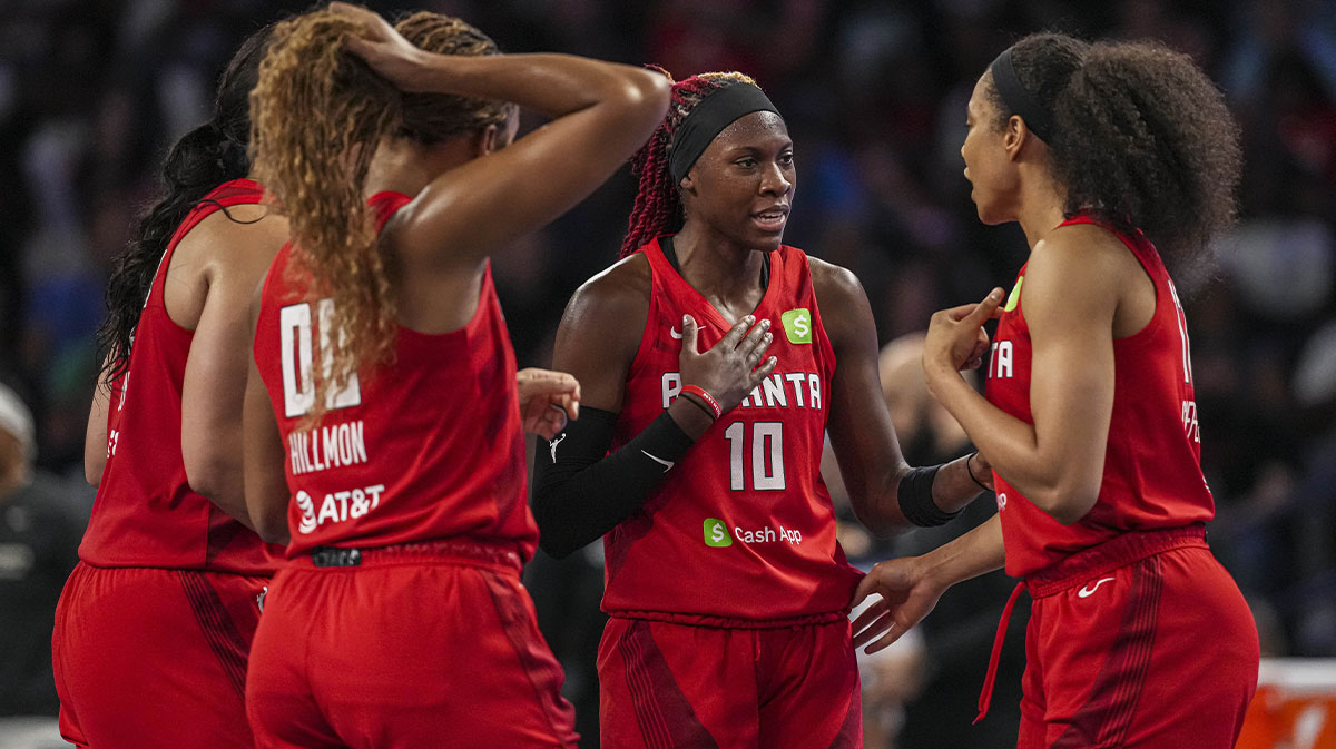 Jun 10, 2025; College Park, Georgia, USA; Atlanta Dream guard Rhyne Howard (10) huddles with her teammates against the Indiana Fever during the second half at Gateway Center Arena at College Park. Mandatory Credit: Dale Zanine-Imagn Images