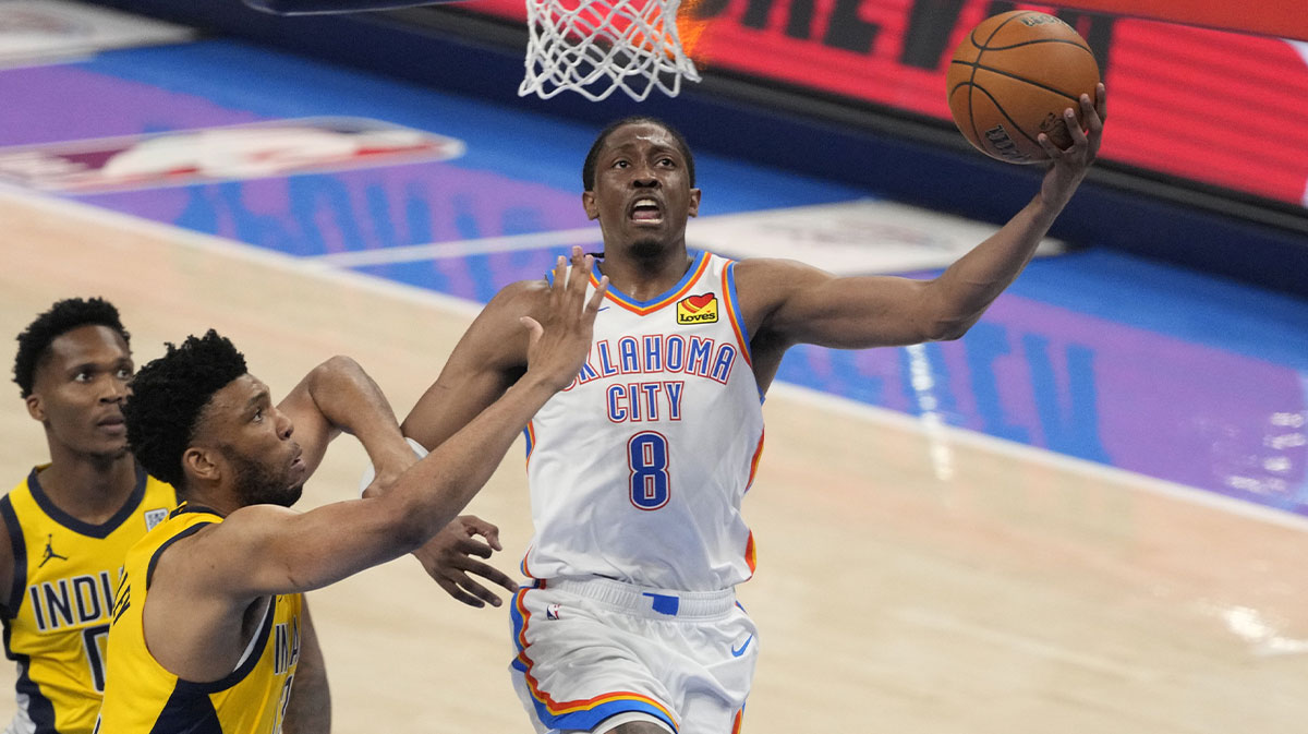 Oklahoma City Thunder forward Jalen Williams (8) shoots against Indiana Pacers center Tony Bradley (13) during the third quarter of game five of the 2025 NBA Finals at Paycom Center.