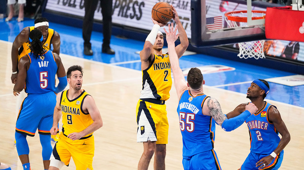 Indiana Pacers guard Andrew Nembhard (2) jumps for a shot against the Oklahoma City Thunder during the second quarter of game seven of the 2025 NBA Finals at Paycom Center.