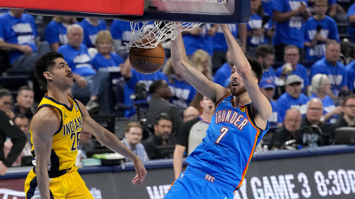Oklahoma City Thunder forward Chet Holmgren (7) dunks the ball past Indiana Pacers guard Ben Sheppard (26) during the second quarter of game two of the 2025 NBA Finals at Paycom Center.