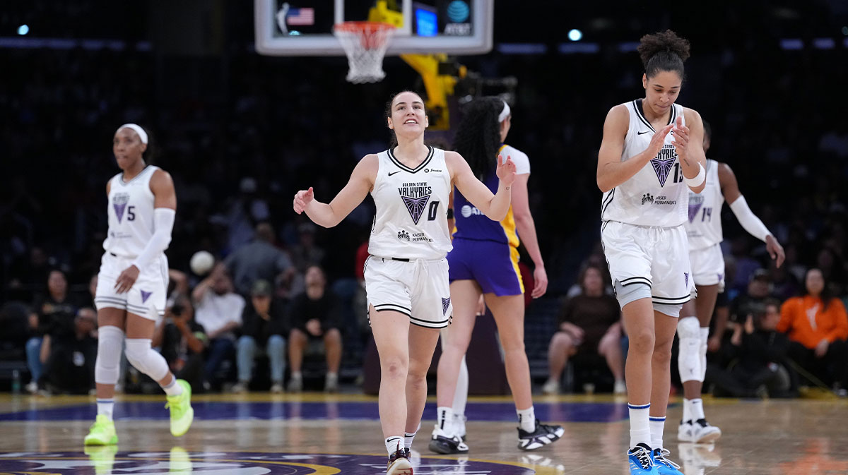 Golden State Valkyries guard Carla Leite (0) and forward Janelle Salaun (13) celebrate in overtime against the LA Sparks at Crypto.com Arena.