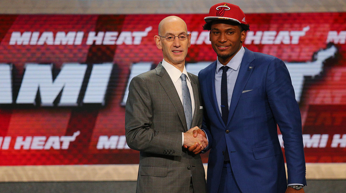 Justise Winslow (Duke) greets NBA commissioner Adam Silver after being selected as the number ten overall pick to the Miami Heat in the first round of the 2015 NBA Draft at Barclays Center.