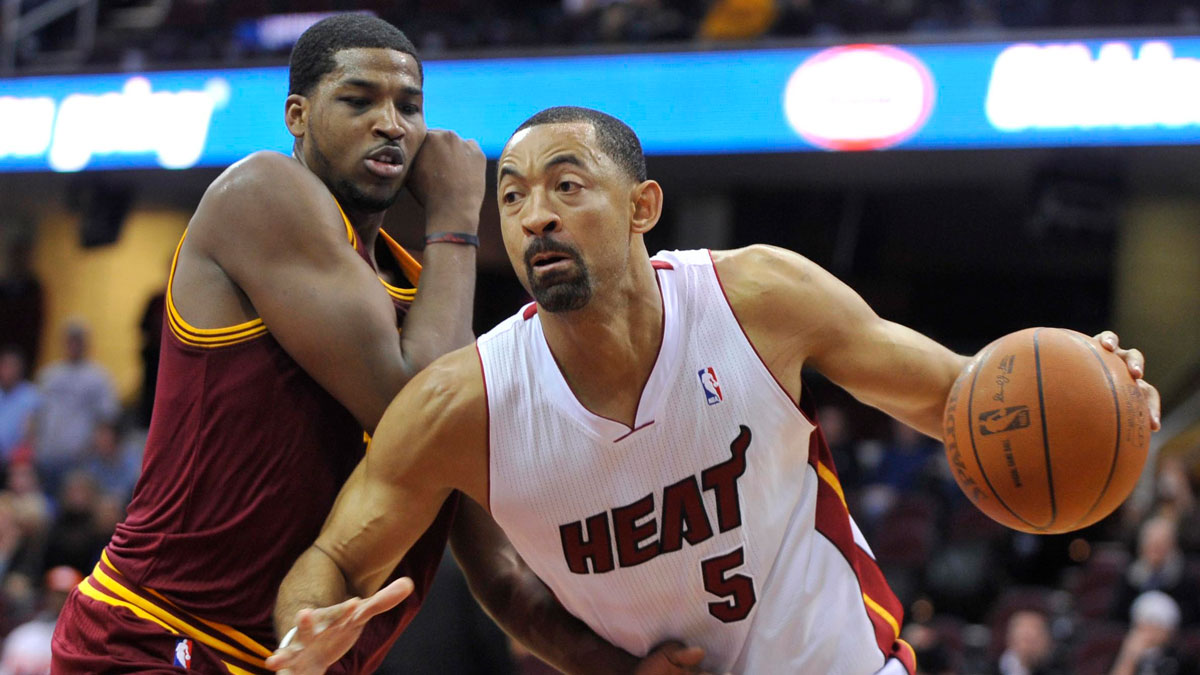 Miami Heat power forward Juwan Howard (5) drives against Cleveland Cavaliers forward Tristan Thompson (13) in the fourth quarter at Quicken Loans Arena.