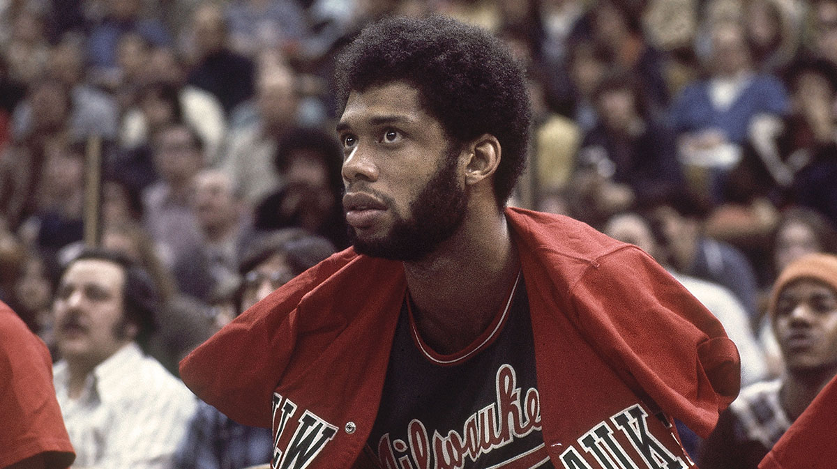 Milwaukee Bucks center Kareem Abdul-Jabbar (33) sits on the bench during the 1974-75 season.