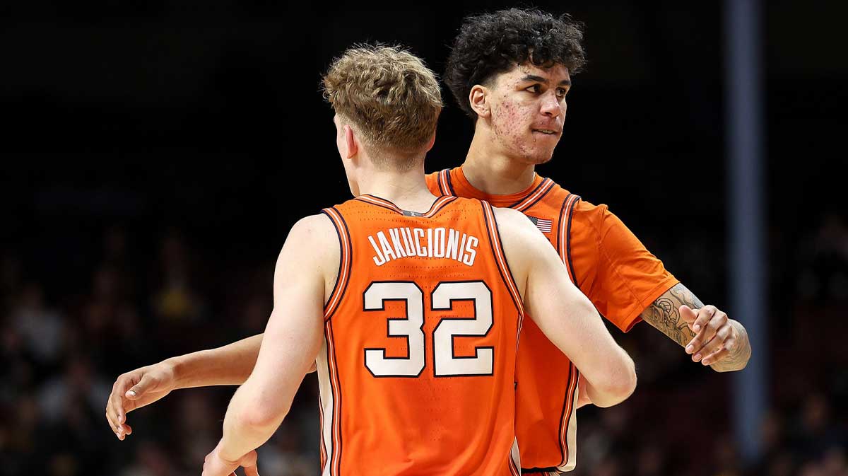 Illinois Fighting Illini forward Will Riley (7) and guard Kasparas Jakucionis (32) celebrate during the second half against the Minnesota Golden Gophers at Williams Arena.