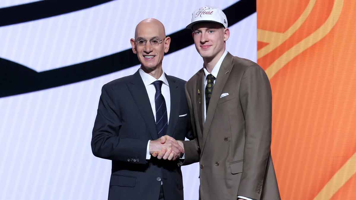 Kasparas Jakucionis stands with NBA commissioner Adam Silver after being selected as the 20th pick by the Miami Heat in the first round of the 2025 NBA Draft at Barclays Center.