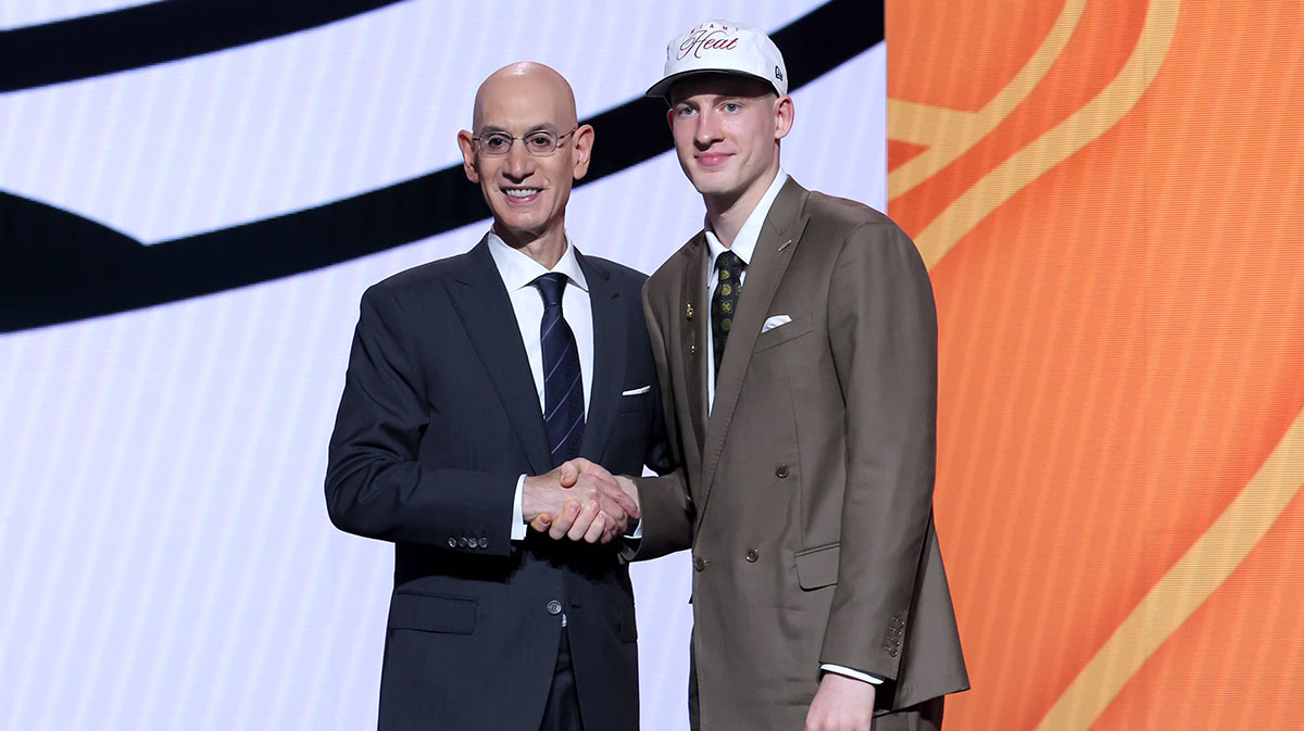 Jun 25, 2025; Brooklyn, NY, USA; Kasparas Jakucionis stands with NBA commissioner Adam Silver after being selected as the 20th pick by the Miami Heat in the first round of the 2025 NBA Draft at Barclays Center.