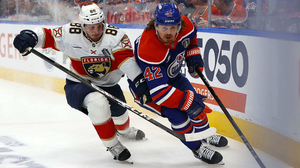 Edmonton Oilers right wing Kasperi Kapanen (42) skates past Florida Panthers defenseman Nate Schmidt (88) in the third period in game one of the 2025 Stanley Cup Final at Rogers Place.