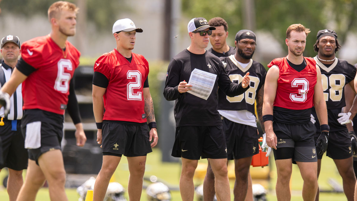 New Orleans Saints quarterback Tyler Shough (6) and quarterback Spencer Rattler (2) and quarterback Jake Haener (3) look on during minicamp at Ochsner Sports Performance Center.