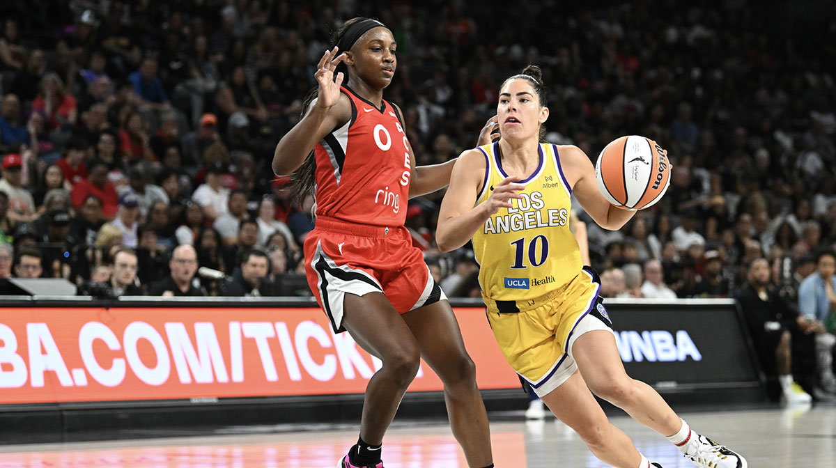 Los Angeles Sparks guard Kelsey Plum (10) drives past Las Vegas Aces guard Jackie Young (0) in the fourth quarter of their game at Michelob Ultra Arena.