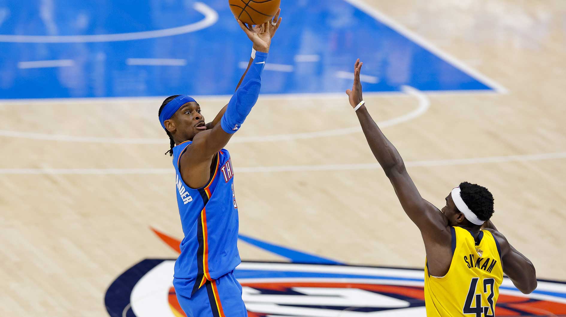 Oklahoma City Thunder guard Shai Gilgeous-Alexander (2) shoots the ball over Indiana Pacers forward Pascal Siakam (43) during the second quarter of game two of the 2025 NBA Finals at Paycom Center.