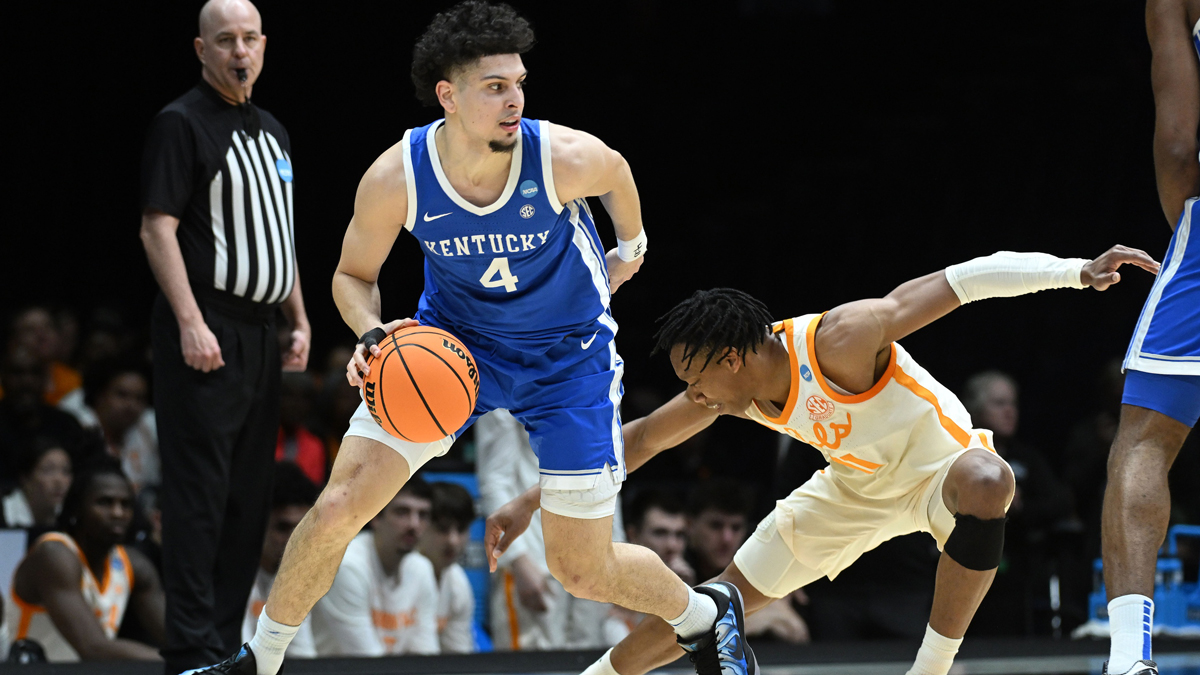 Kentucky Wildcats guard Koby Brea (4) dribbles the ball against Tennessee Volunteers guard Jordan Gainey (11) in the first half during a Midwest Regional semifinal of the 2025 NCAA tournament at Lucas Oil Stadium.