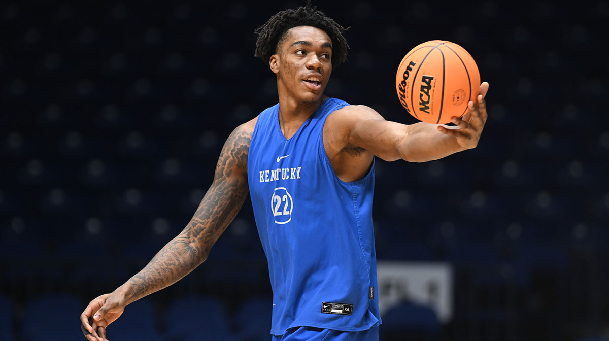 Kentucky Wildcats center Amari Williams (22) stretches during the NCAA tournament midwest regional practice day at Lucas Oil Stadium.