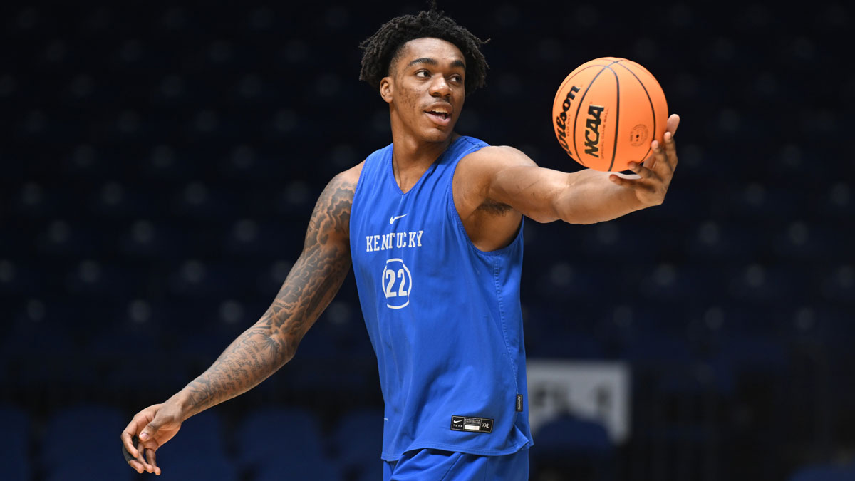 Kentucky Wildcats center Amari Williams (22) stretches during the NCAA tournament midwest regional practice day at Lucas Oil Stadium.