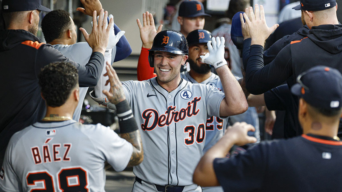 Detroit Tigers designated hitter Kerry Carpenter (30) celebrates with teammates in the dugout after hitting a two-run home run against the Chicago White Sox during the fourth inning at Rate Field.