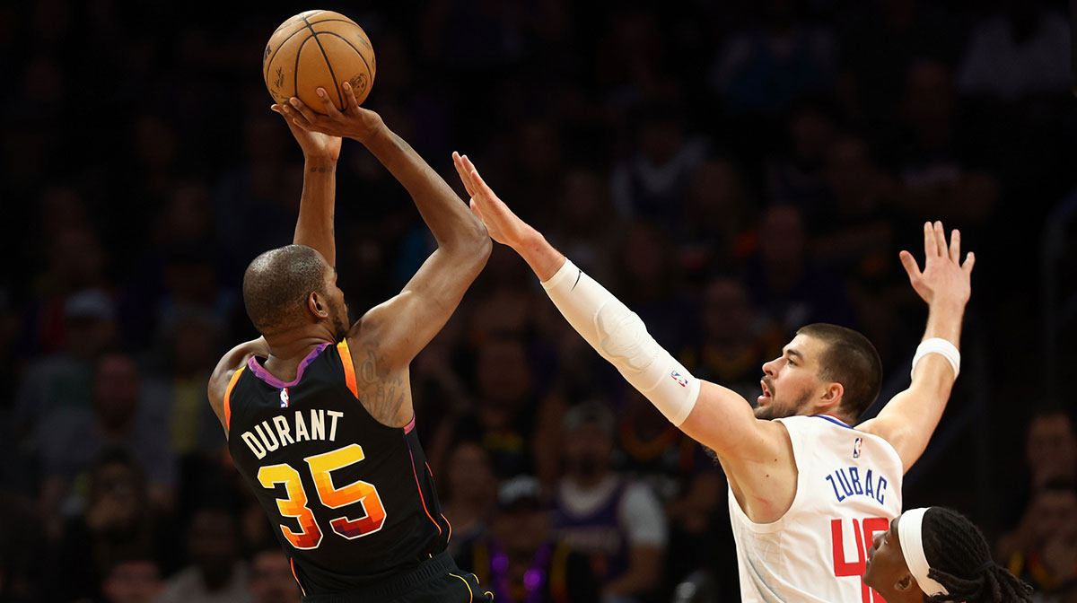 Phoenix Suns forward Kevin Durant (35) shoots the ball against Los Angeles Clippers center Ivica Zubac (40) in the first half during game two of the 2023 NBA playoffs at Footprint Center.