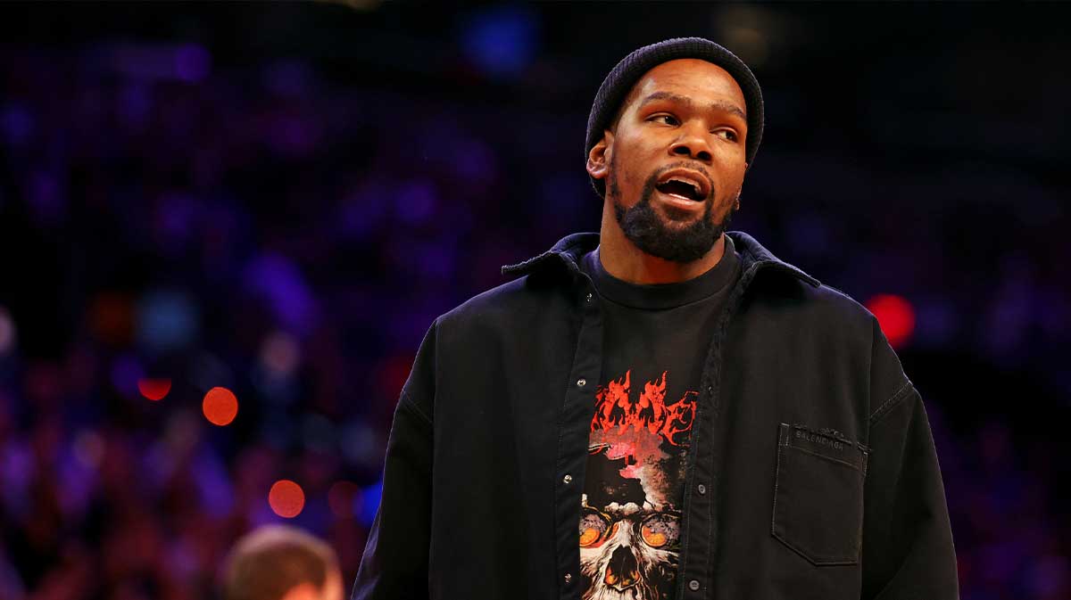 Phoenix Suns forward Kevin Durant looks on from the sidelines during the game between the Phoenix Suns and the New York Knicks at Footprint Center.