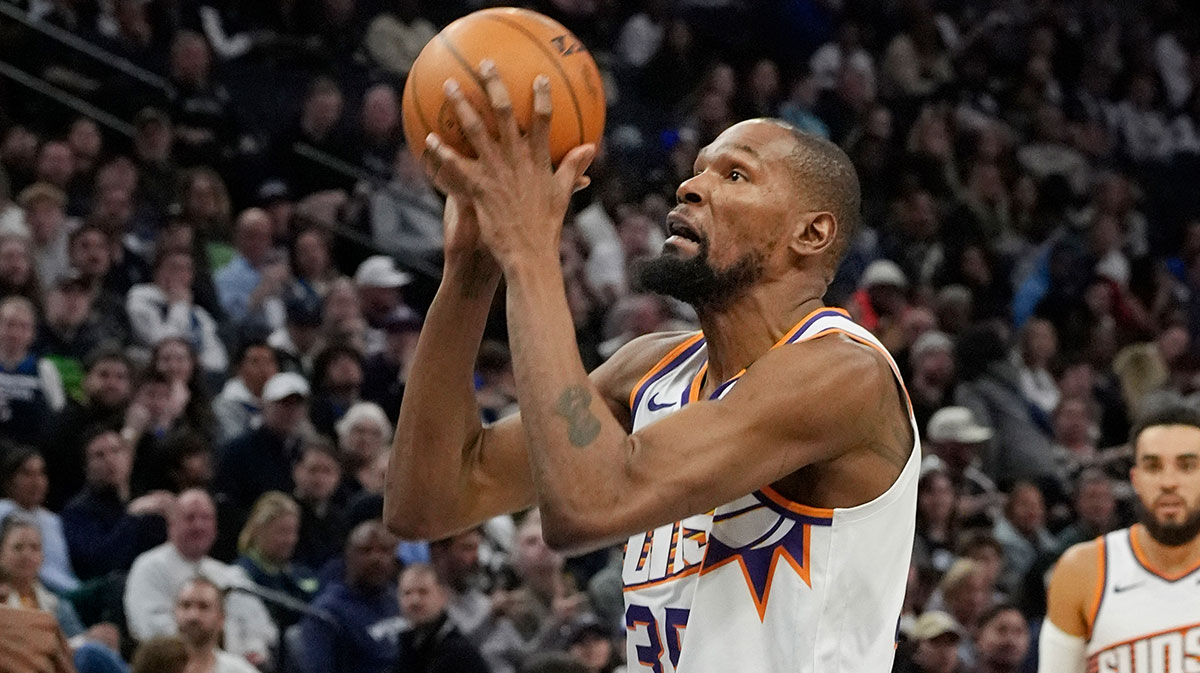 Phoenix Suns forward Kevin Durant (35) shoots against the Minnesota Timberwolves in the third quarter at Target Center.