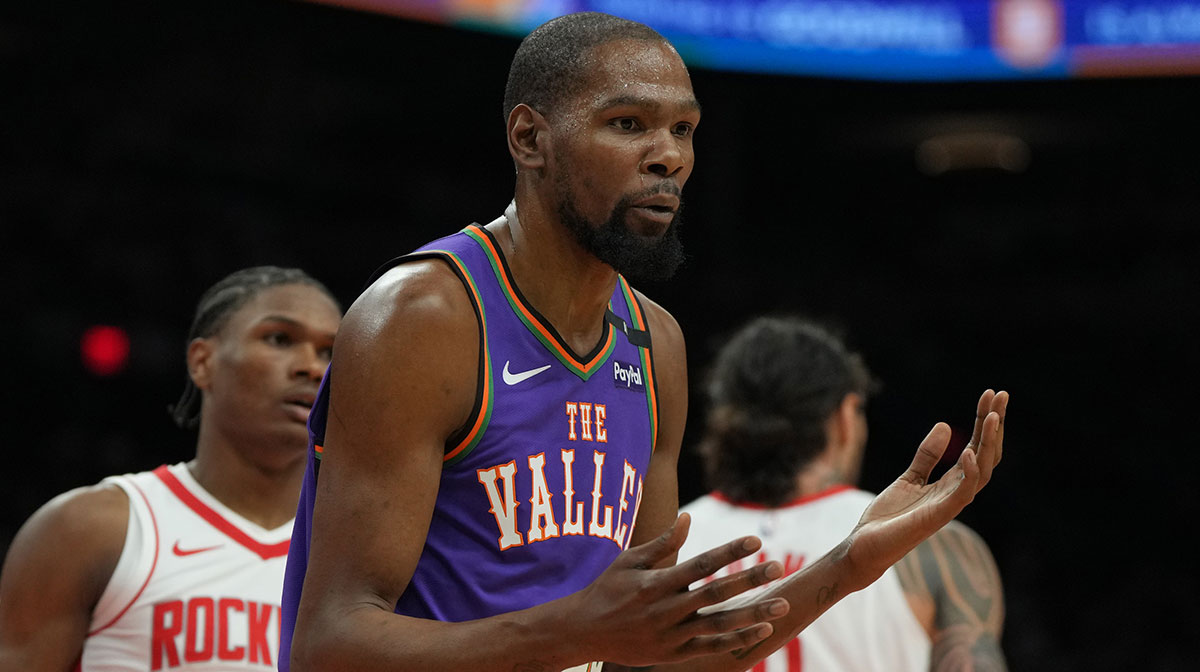Phoenix Suns forward Kevin Durant (35) reacts after fouling a Houston Rockets player in the first half at Footprint Center.