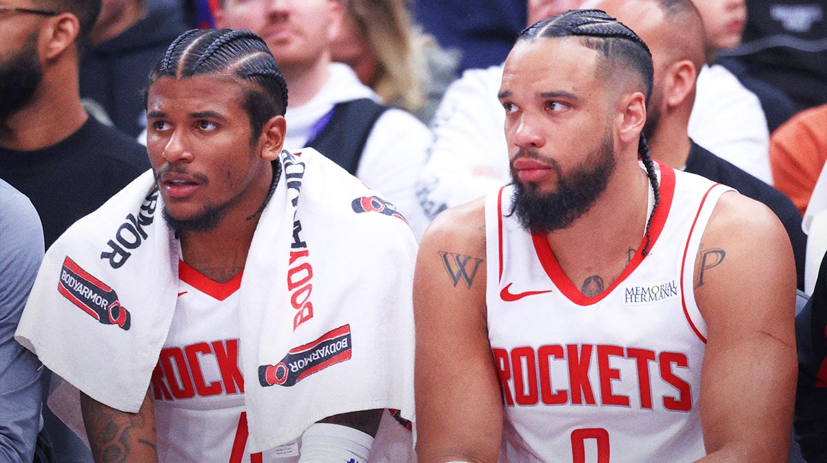 Houston Rockets guard Jalen Green (4) and forward Dillon Brooks (9) watch play against the Utah Jazz from the bench during the first half at Delta Center.