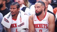 Houston Rockets guard Jalen Green (4) and forward Dillon Brooks (9) watch play against the Utah Jazz from the bench during the first half at Delta Center.