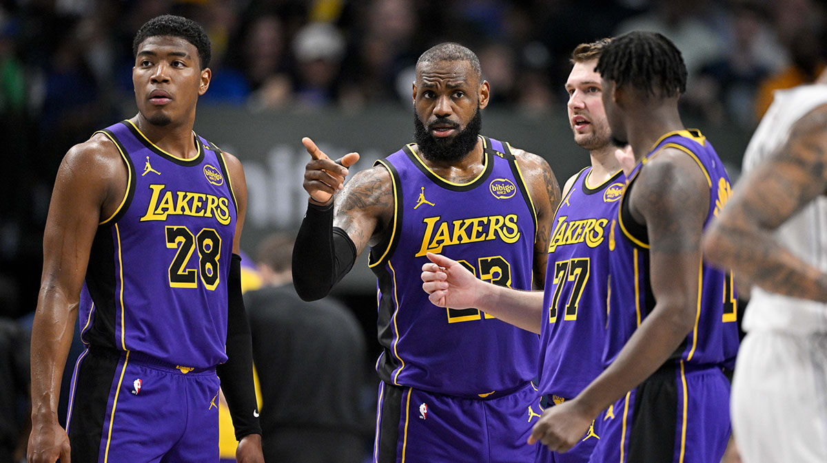 Los Angeles Lakers forward Rui Hachimura (28) and forward LeBron James (23) and guard Luka Doncic (77) and forward Dorian Finney-Smith (17) during the game between the Dallas Mavericks and the Los Angeles Lakers at American Airlines Center.
