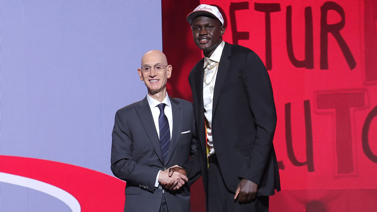 Khaman Maluach stands with NBA commissioner Adam Silver after being selected as the tenth pick by the Houston Rockets in the first round of the 2025 NBA Draft at Barclays Center.
