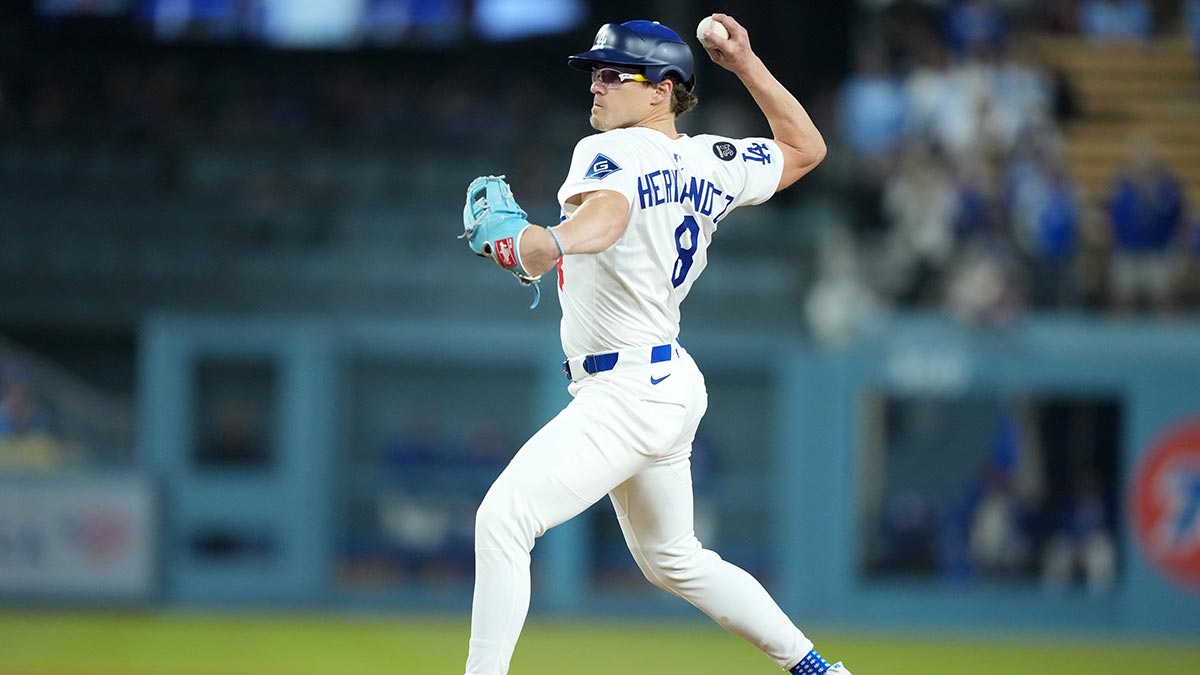 Apr 29, 2025; Los Angeles, California, USA; Los Angeles Dodgers first baseman Kike Hernandez (8) pitches in the ninth inning against the Miami Marlins at Dodger Stadium.