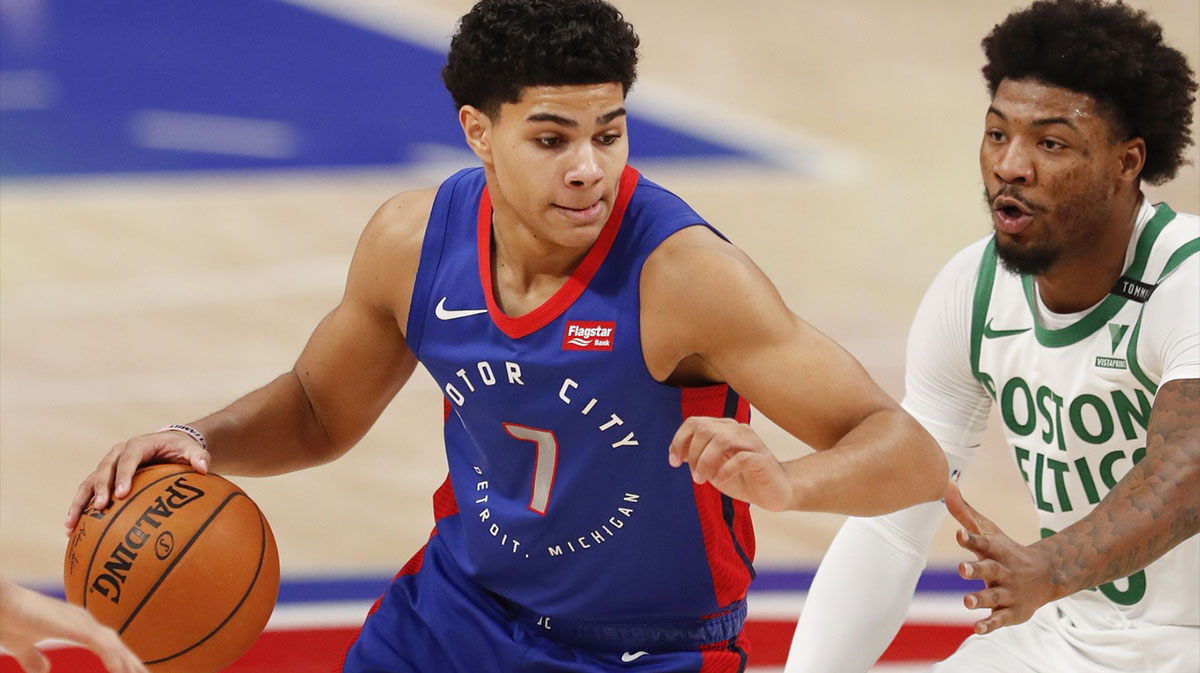 Detroit Pistons guard Killian Hayes (7) gets defended by Boston Celtics guard Marcus Smart (36) during the first quarter at Little Caesars Arena.